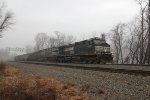 NS 9747 leads a coal train east through MP 116